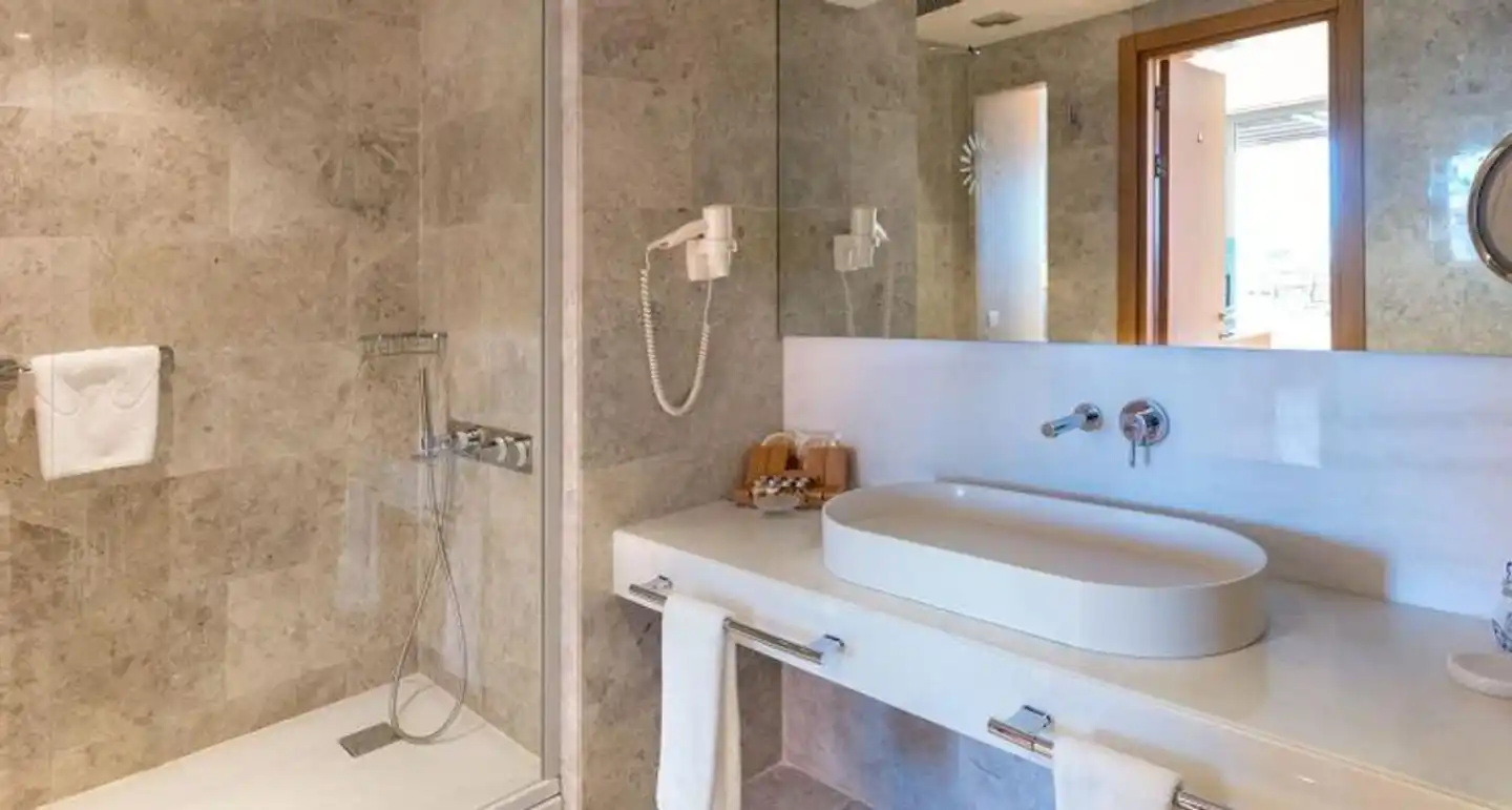 On'Live Deluxe Hotel Badezimmer