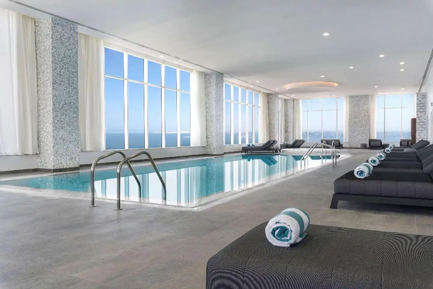 Aleph Doha Residences, Curio Collection by Hilton Hallenbad