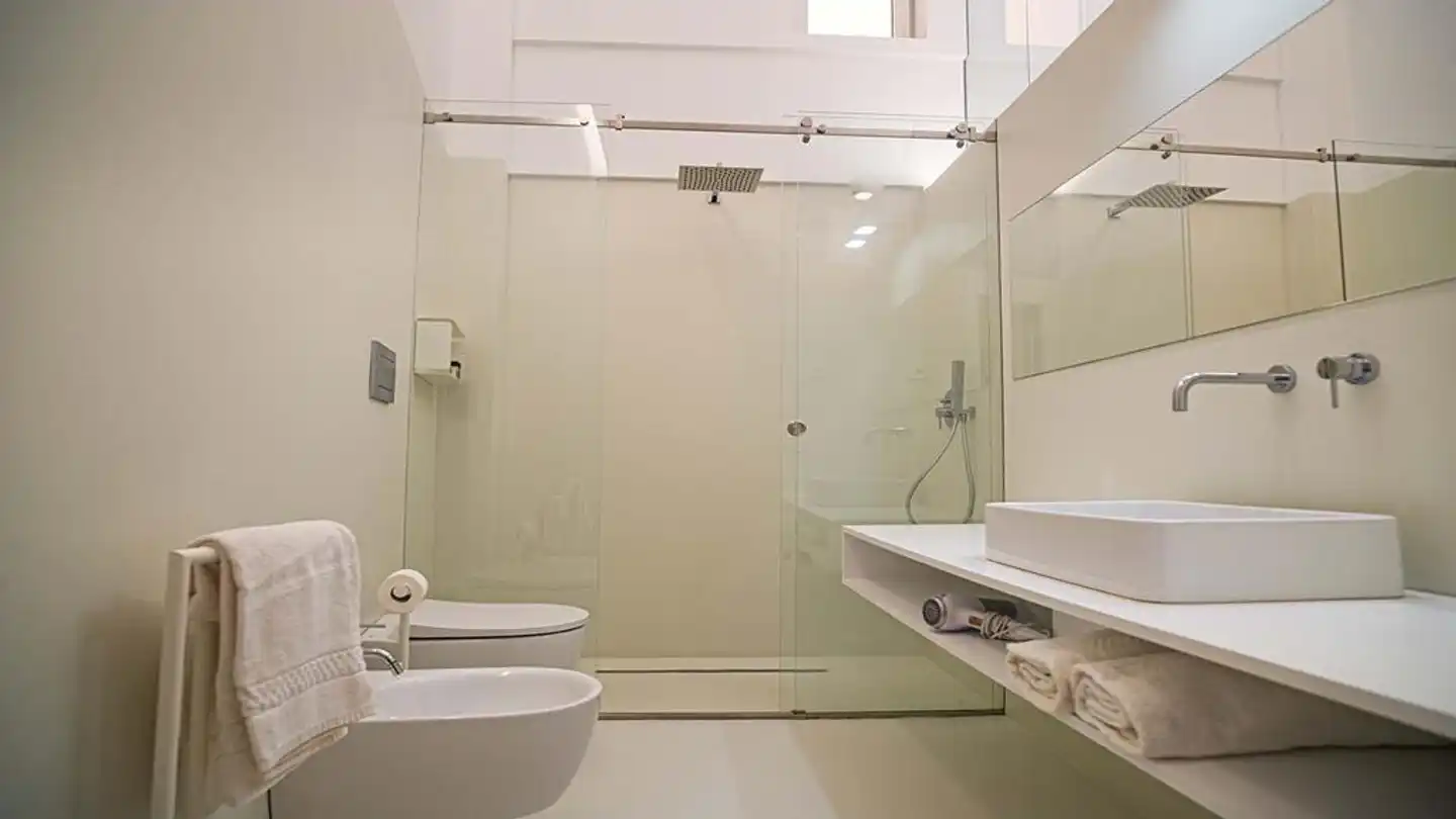Five Place Design Suite & Apartments Badezimmer