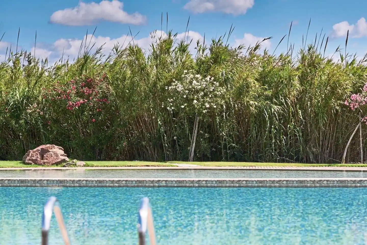 Baia di Chia Resort Sardinia, Curio Collection by Hilton Pool