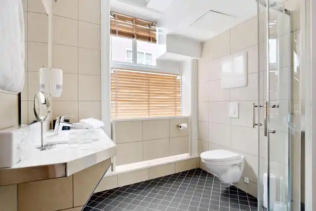 Best Western Plus Hotel Bakeriet Badezimmer