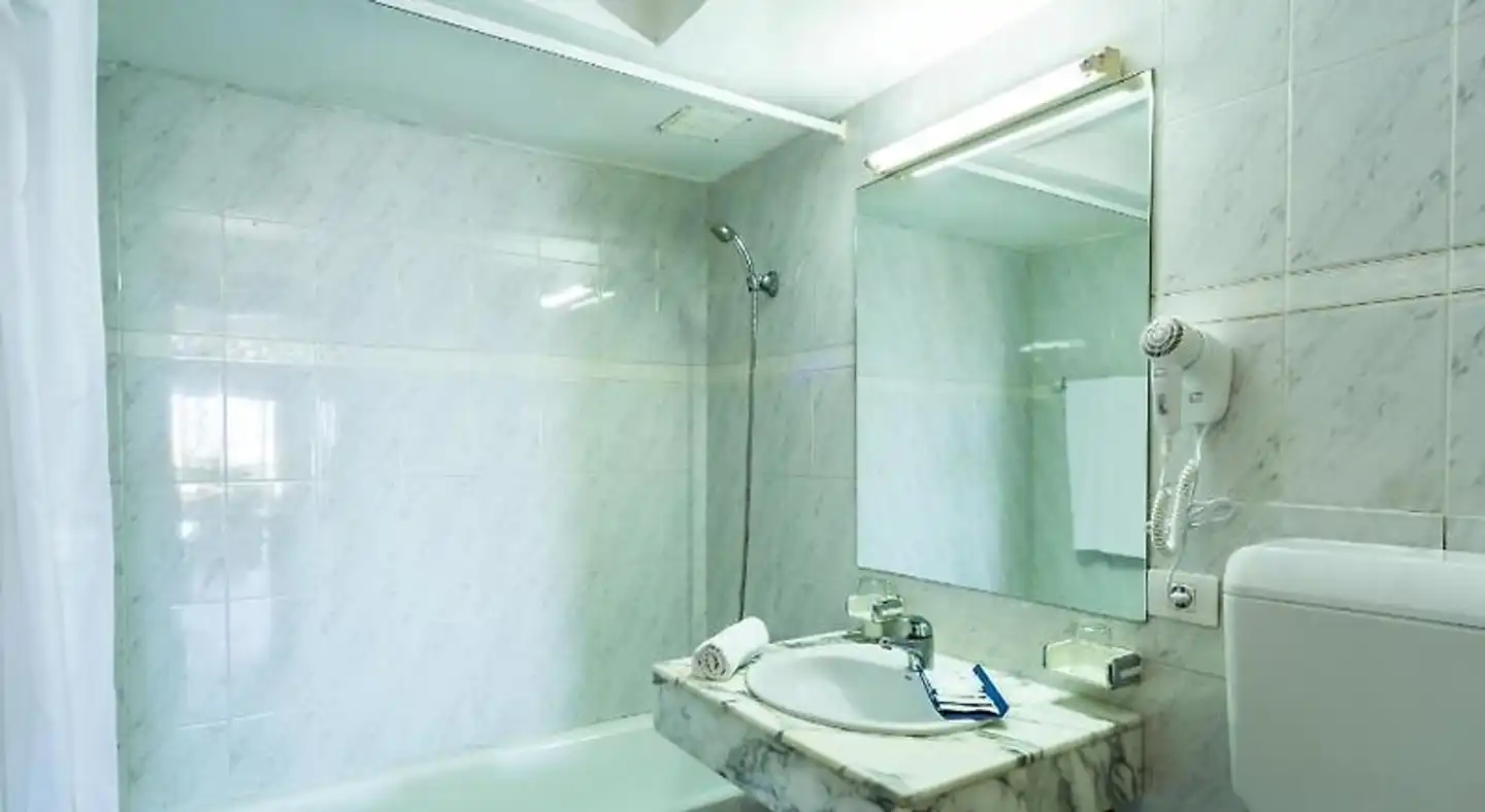 Hotel BelleVue Aquarius Badezimmer