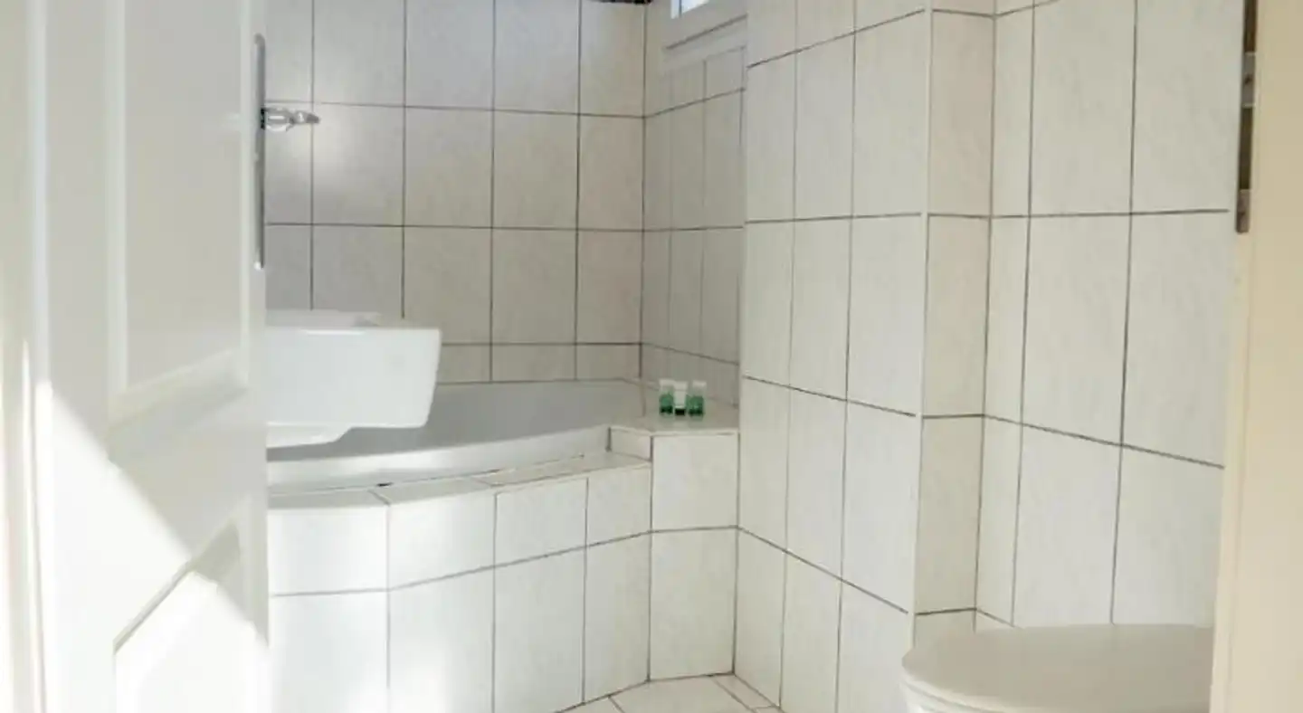 Botzoris Apartments Badezimmer
