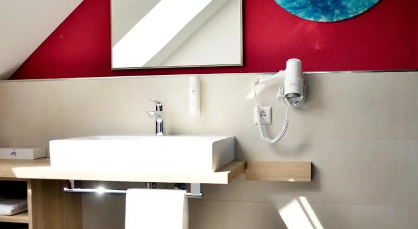 R & J Hotel Badezimmer